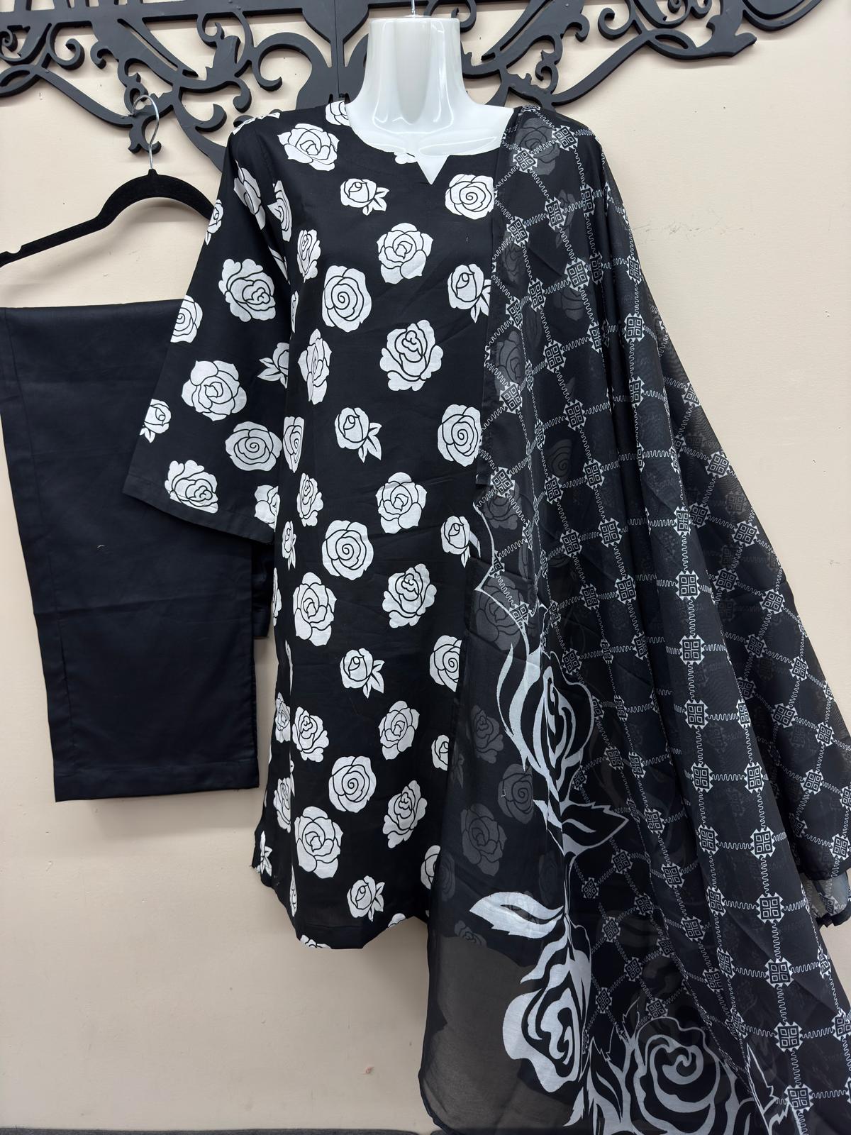 Black floral printed lawn suit for women by Maryam Qasim Boutique