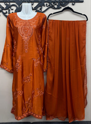 Burnt orange Pakistani embroidered suit with silk trousers and chiffon dupatta