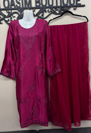 Deep magenta Pakistani embroidered suit with silk trousers and lace dupatta