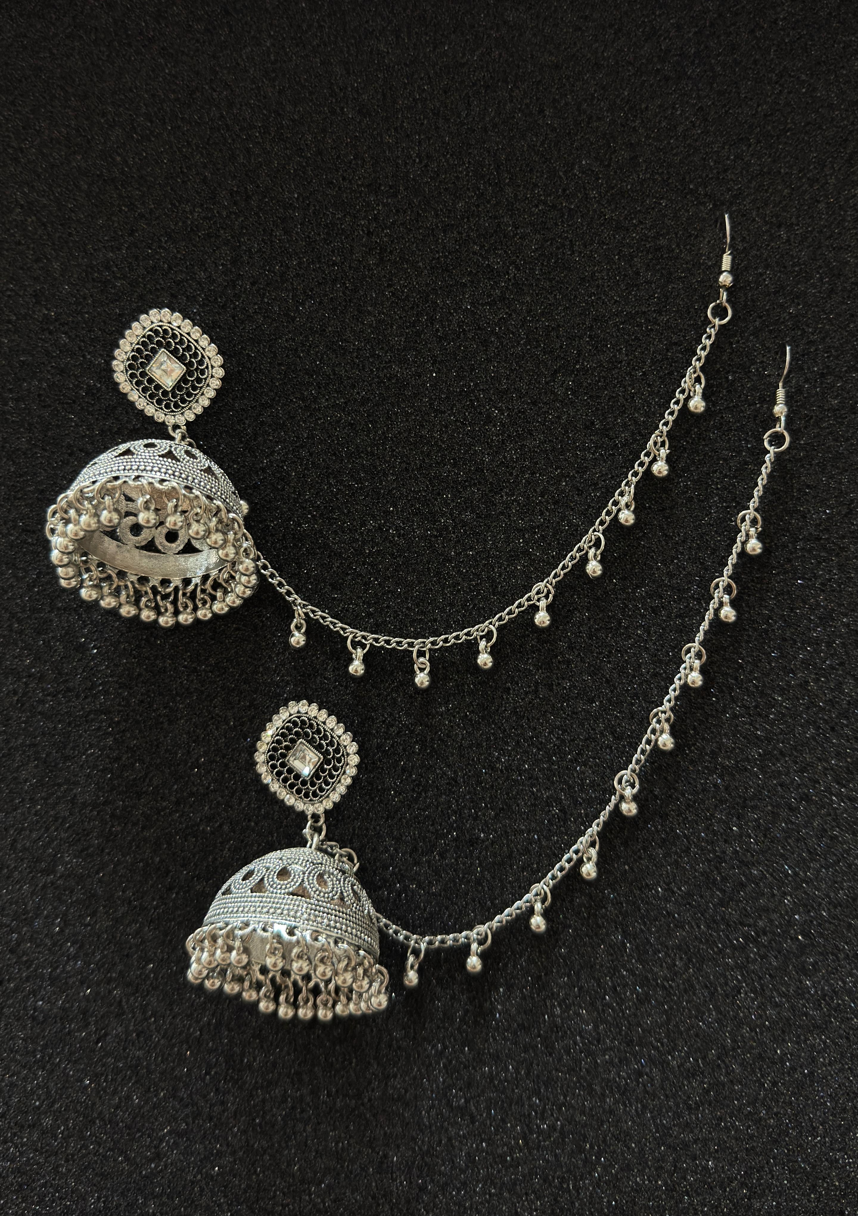 Antique oxidized silver jhumka earrings with decorative sahara chain for traditional Pakistani and Indian outfits.