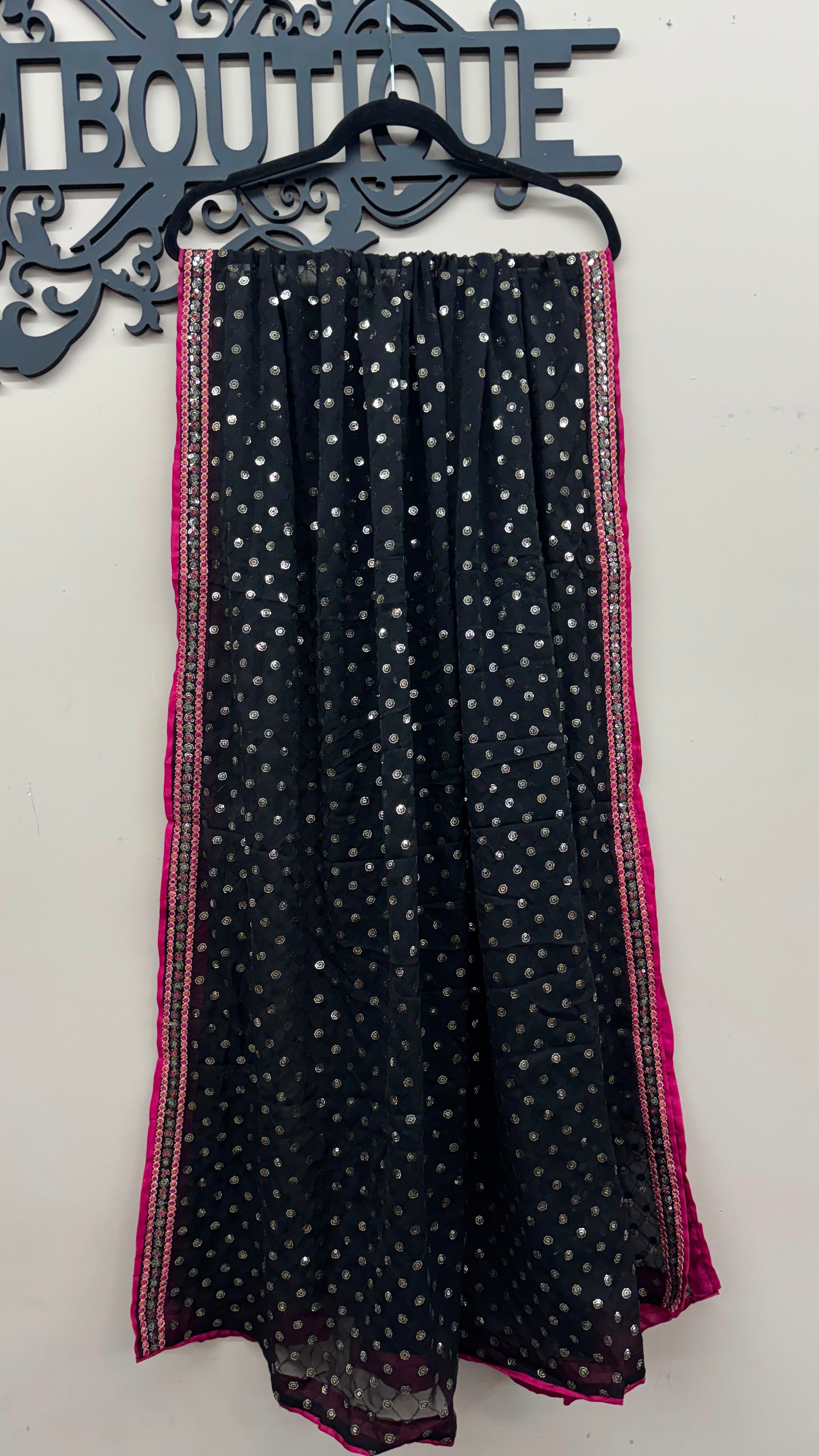 Black Pakistani formal suit with pink embroidery and sequined dupatta