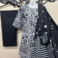 Black printed cotton lawn suit for women by Maryam Qasim Boutique