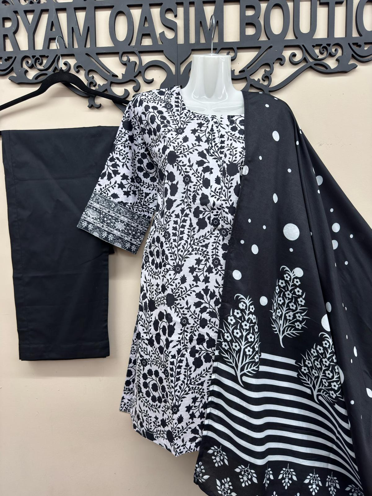 Black printed cotton lawn suit for women by Maryam Qasim Boutique