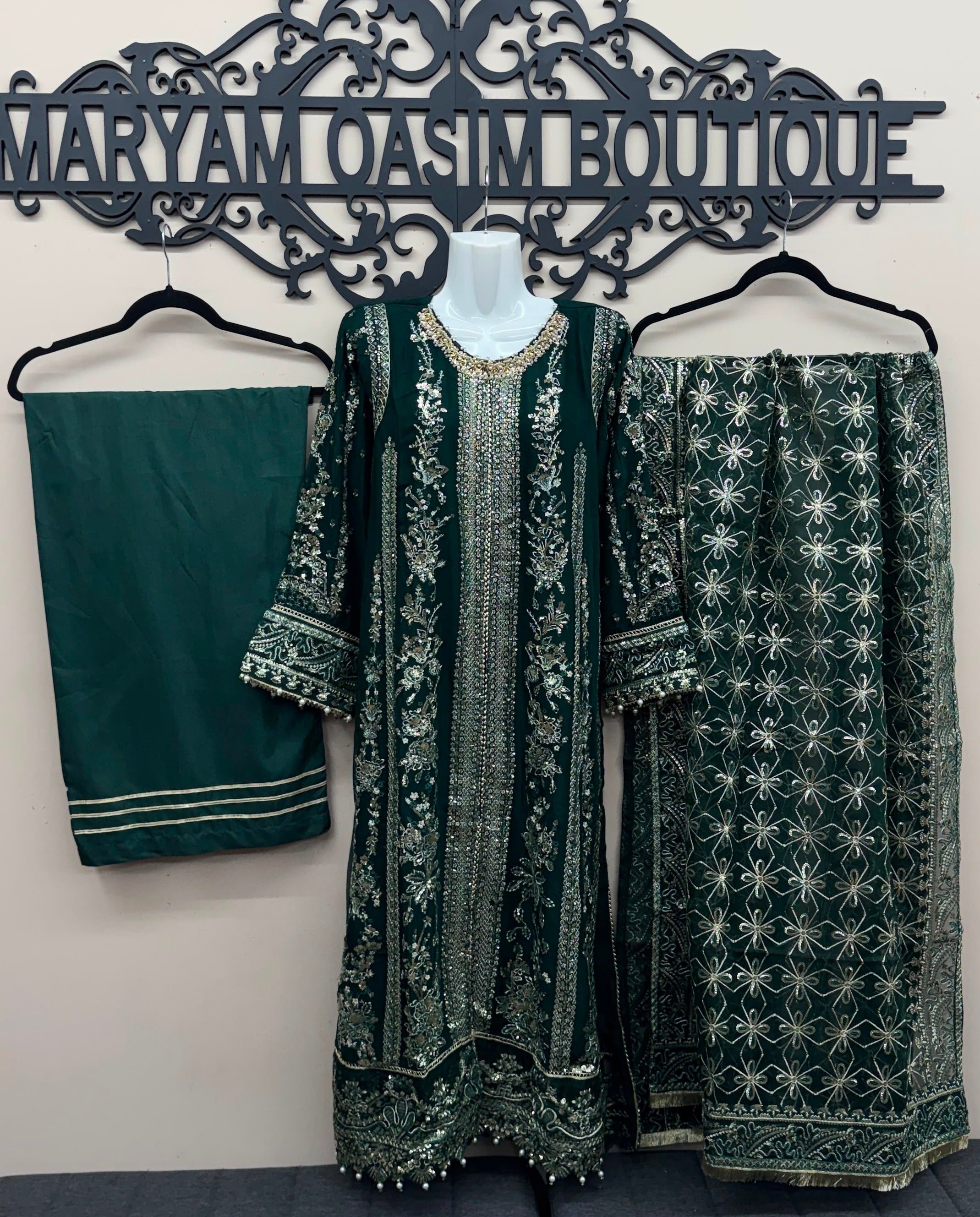 Emerald green Pakistani wedding suit with embroidered front