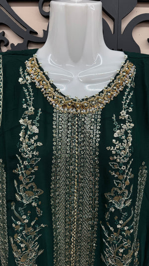Emerald green Pakistani wedding suit with embroidered front in Canda.