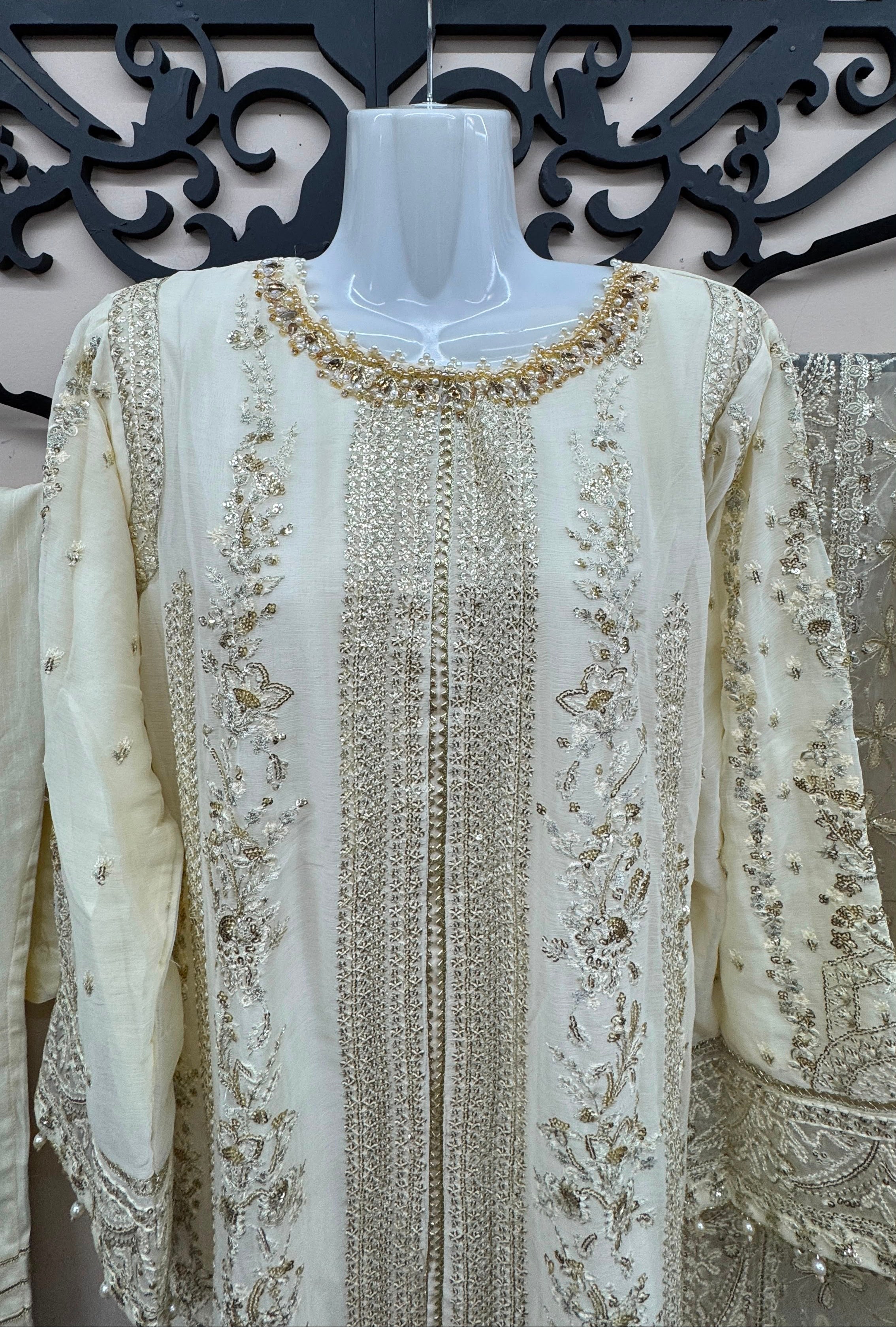 Ivory cream Pakistani wedding suit with embroidered detail