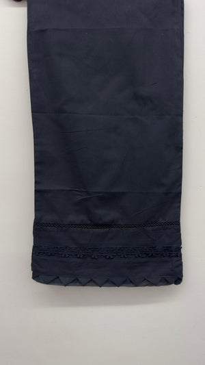 Khaadi black ethnic straight pants styled for South Asian festive wear.