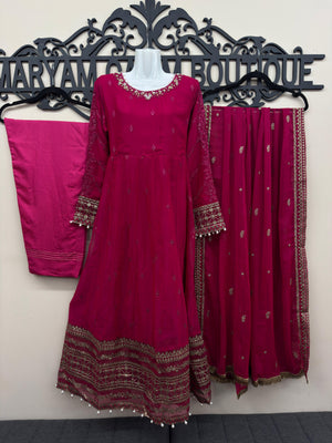 Luxury deep pink 3 piece embroidered maxi dress with matching trousers and embellished dupatta by Maryam Qasim Boutique, elegant Pakistani formal wear for weddings, Eid, parties, and festive occasions.