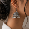 Silver Jhumka Earrings with Multicolor Stone Accents