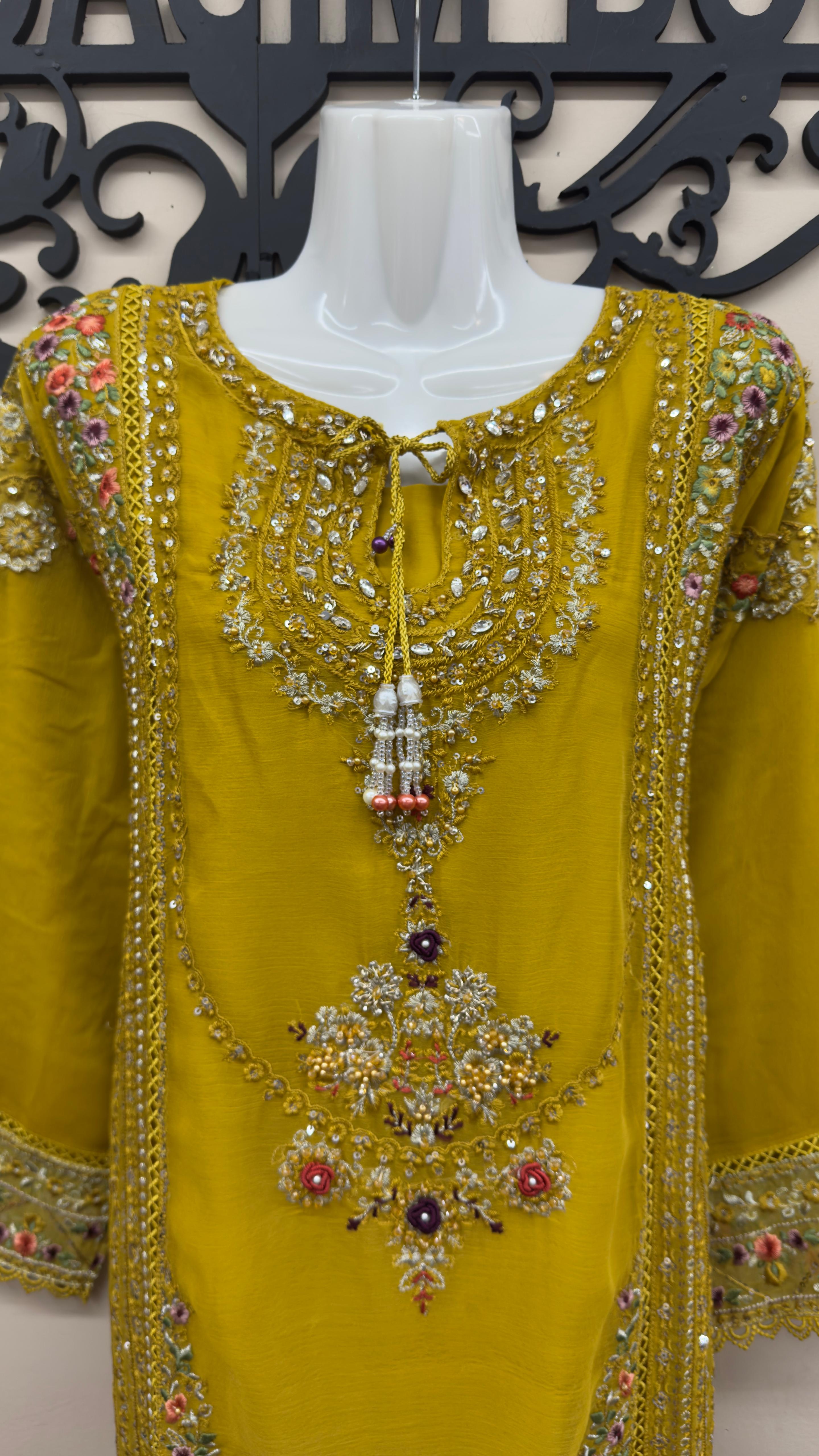 Mustard yellow South Asian formal wear for women