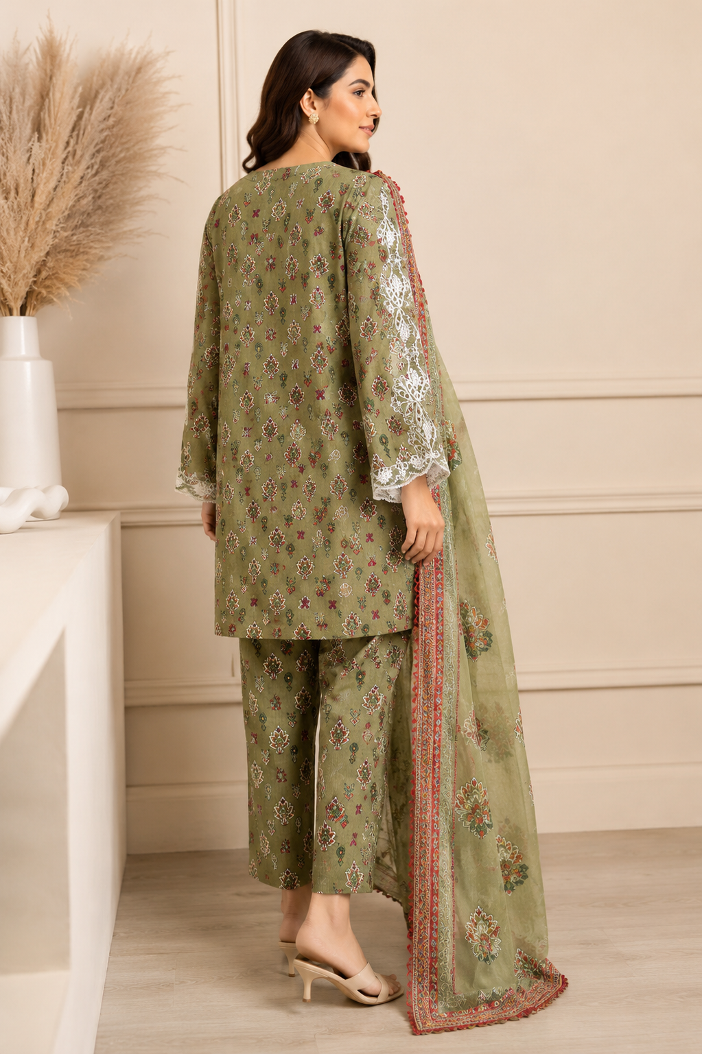 Olive green short shirt with white lace sleeves and embroidered straight trousers