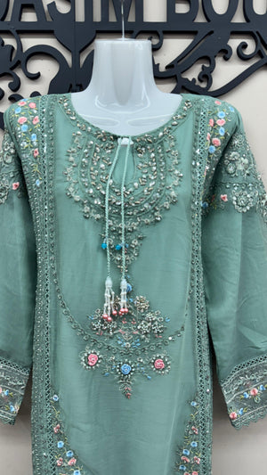 Sage green Pakistani formal suit with floral embroidery