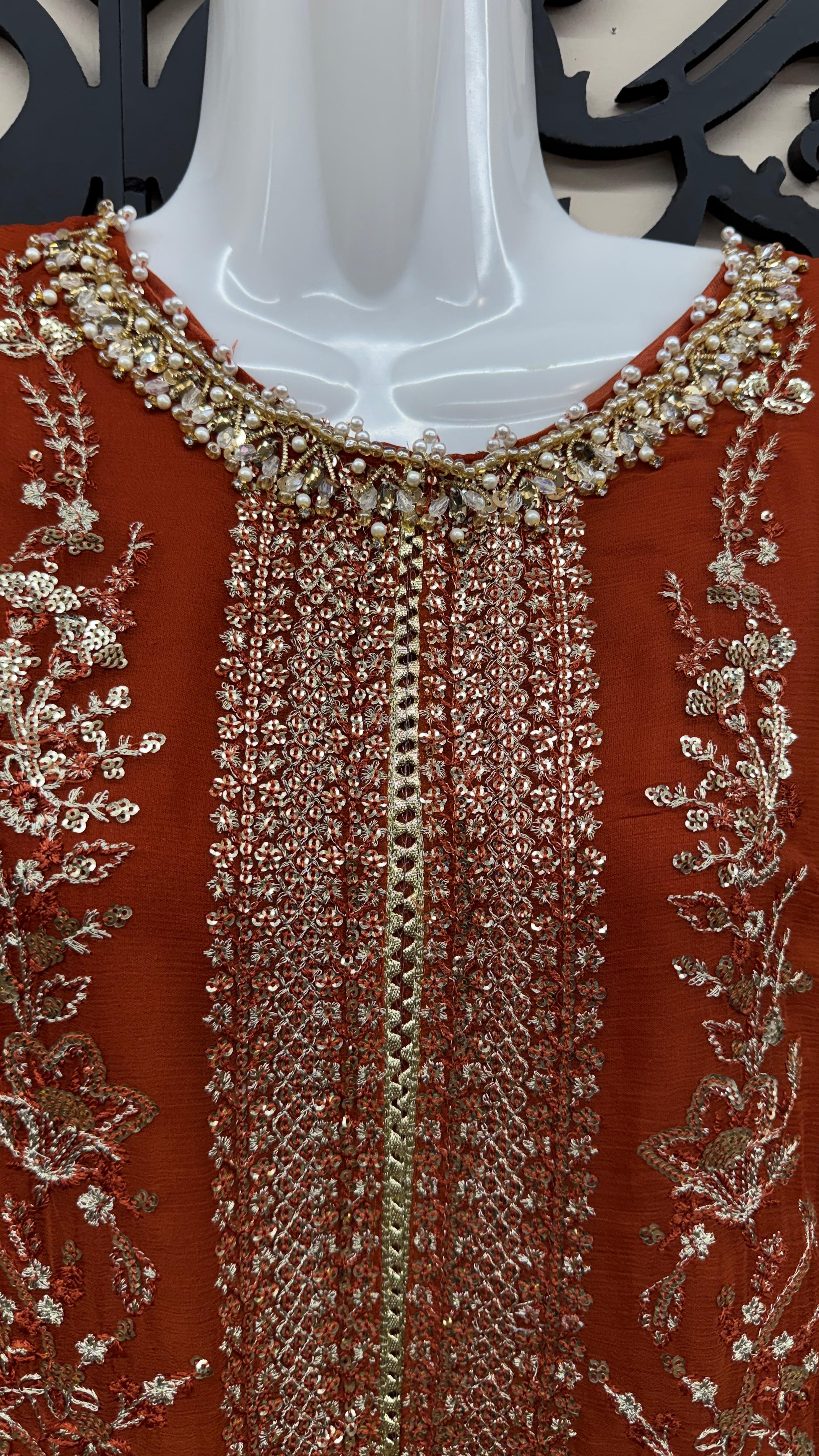 Rust terracotta Pakistani wedding suit with embroidered front in Canada