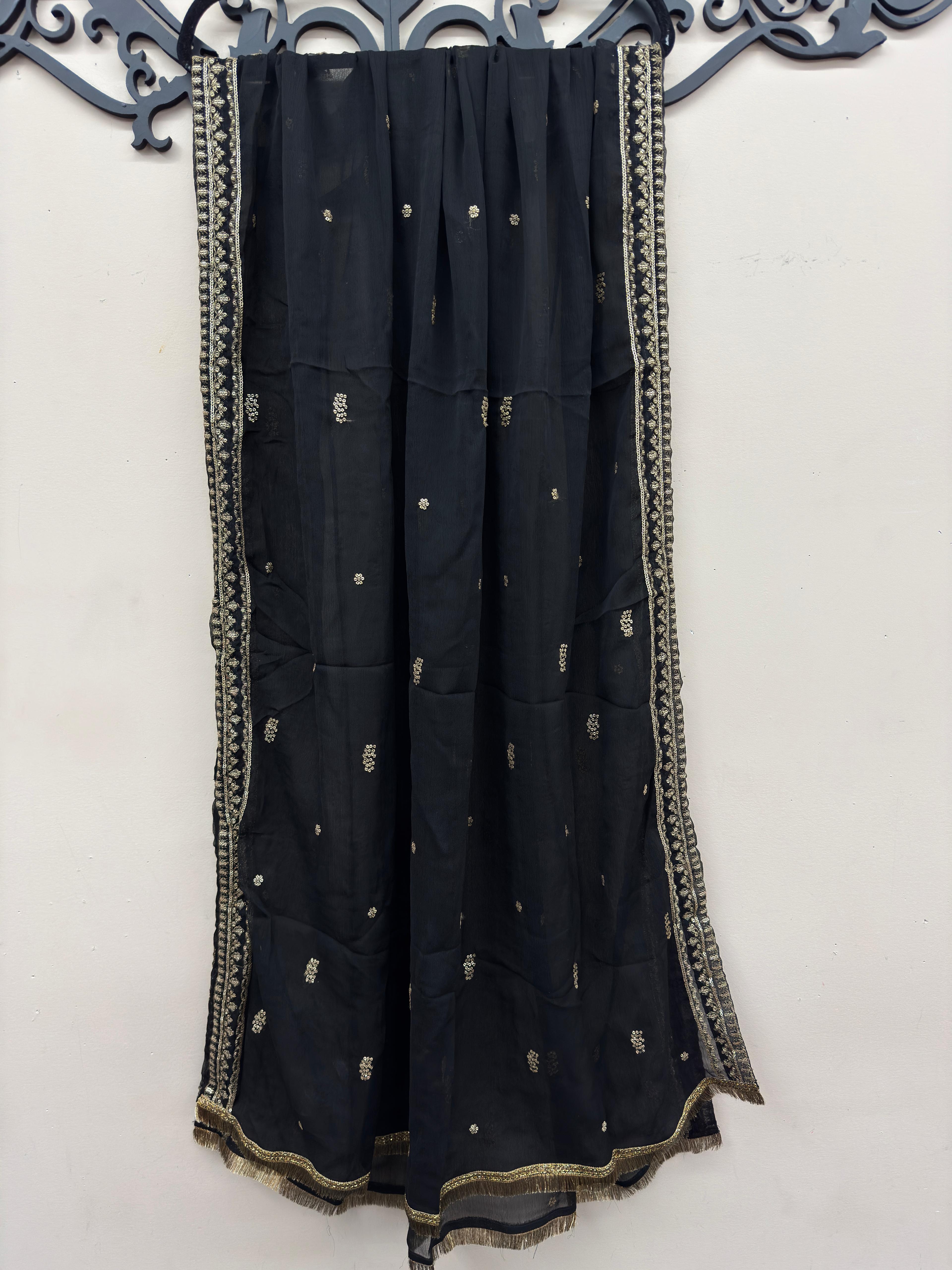 Maryam Qasim Boutique luxury black embroidered maxi suit featuring embellished neckline, matching trousers, and fancy dupatta.